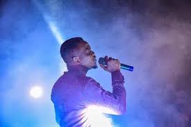 James Ben performing on stage