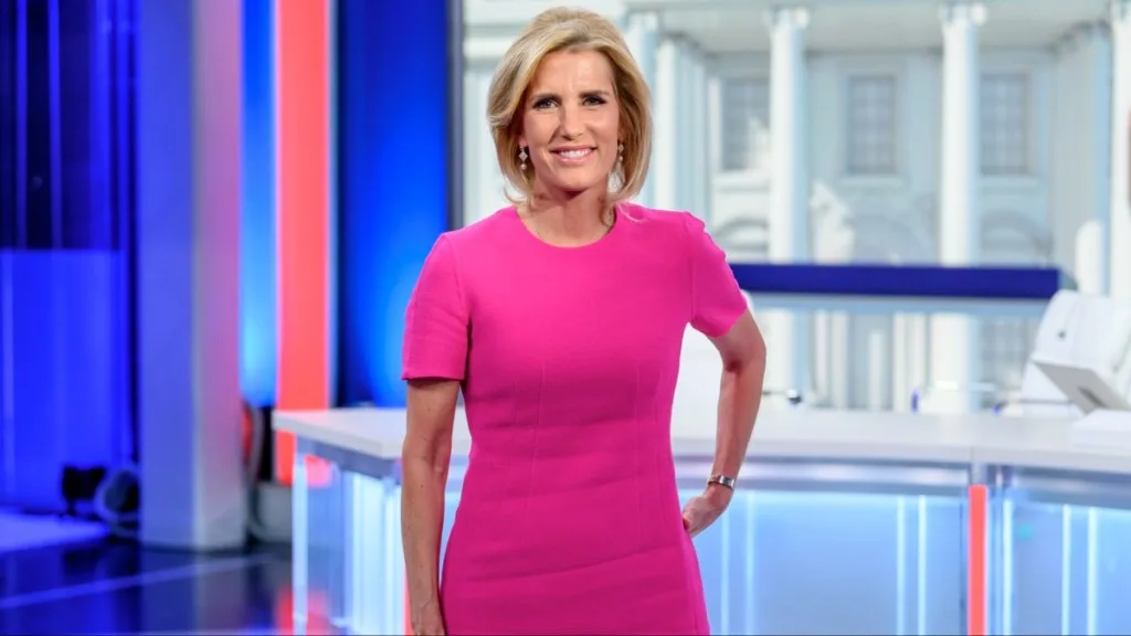 Laura Ingraham in pink dress at news channel 